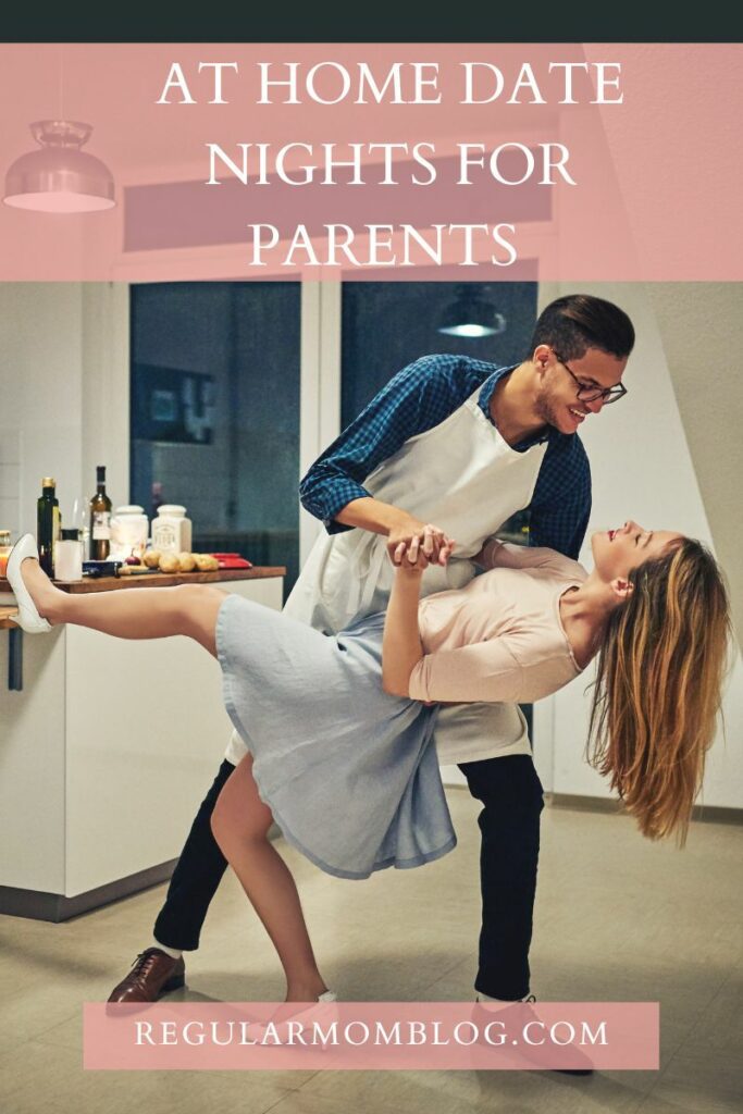 a man and woman in their kitchen dancing for an at home date night for parents