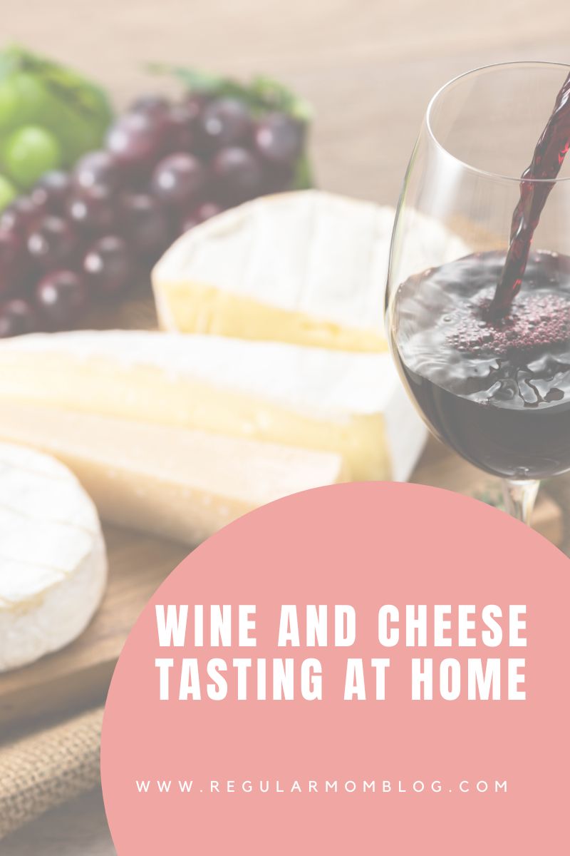 a blog graphic featuring a cheese plate with wine beside of it