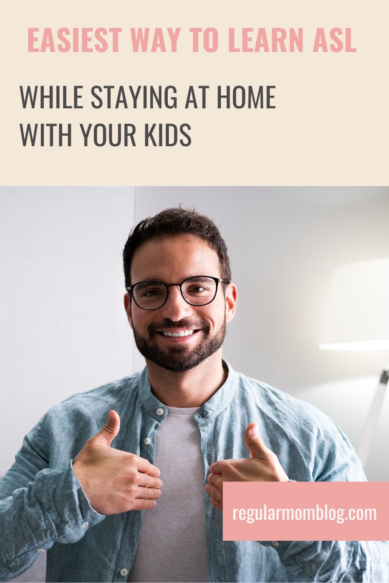 a blog graphic that features a man sitting on the couch in his home and learning asl